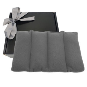 Gray Herbal-Ease® Aromatherapy Uni-Pack (in gift box) - When heated in a microwave, this Uni-pack releases moist heat to help soothe and relax tense muscles. The specially formulated herbal blend is fragrantly aromatic and helps relieve joint pain, aches and muscle tension. Made with highly durable fabrics and quality workmanship, the Uni-Pack may be used for hot or cold therapy. Its versatile shape (10” x 15”) makes it easy to apply to any part of the body.